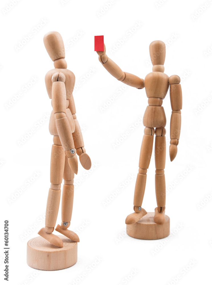 Wooden player receiving red card Wooden player receiving red card