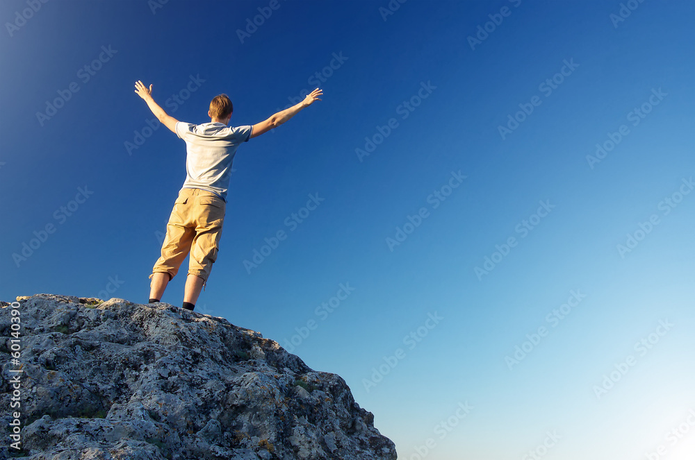 Tourist on the mountain top. Active life concept Tourist on the mountain top. Active life concept
