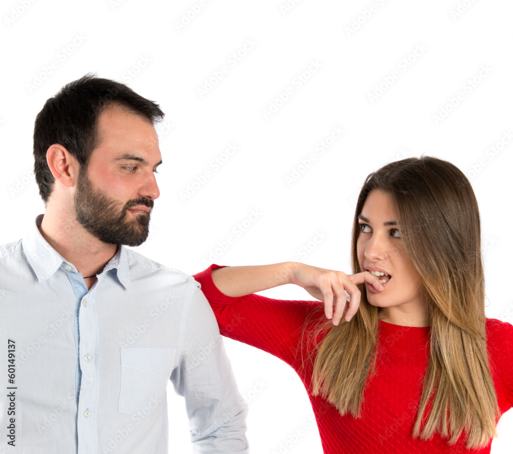 Girl seducing a man over white background Girl seducing a man over white background