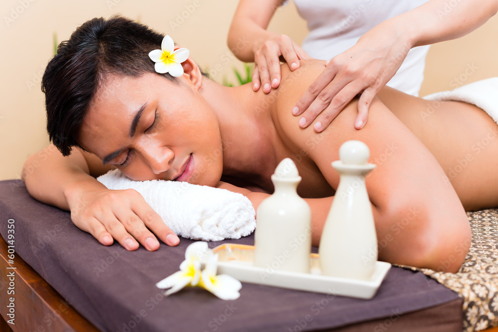Indonesian Asian man at wellness massage Indonesian Asian man at wellness massage