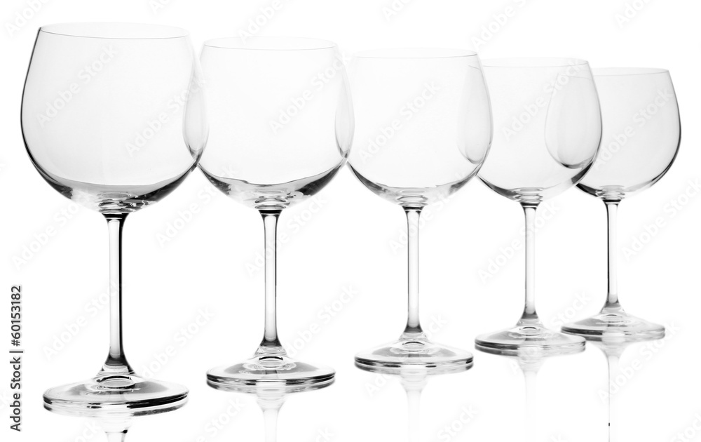 Empty wine glasses arranged and isolated on white Empty wine glasses arranged and isolated on white