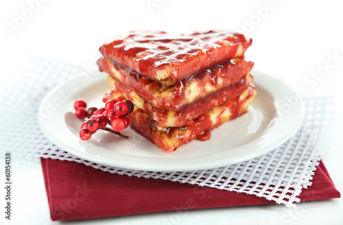 Sweet Belgium waffles with jam, isolated on white