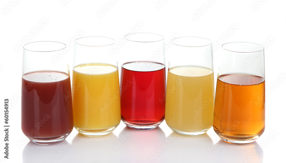 Variety of juices in glasses, isolated on white Variety of juices in glasses, isolated on white