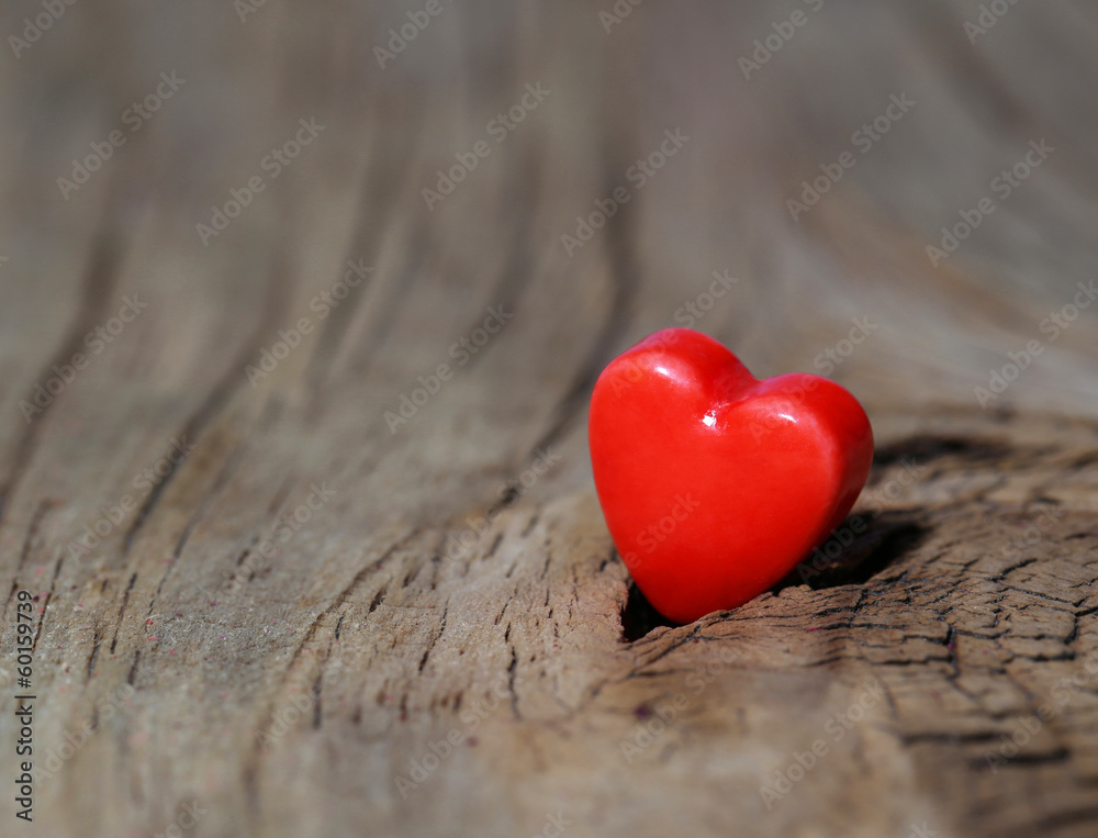 Fototapeta premium Valentines Day background. Hearts on Wooden Texture. Macro