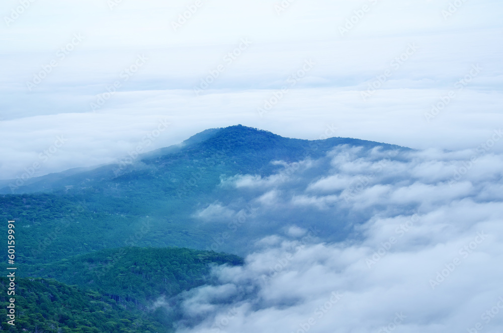 mountain and clouds