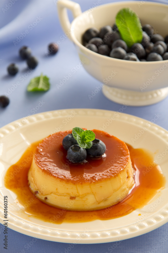 Creme caramel with fresh blueberries. Creme caramel with fresh blueberries.