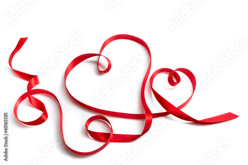 red ribbon that forms a pair of hearts © Romolo Tavani