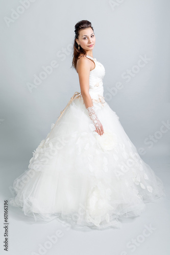 beautiful girl in a white wedding dress profile