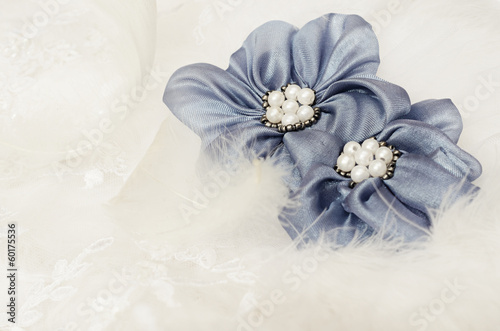 Blue flowers on white lace