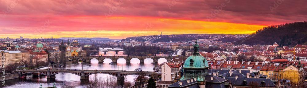 Fototapeta premium Bridges in Prague over the river at sunset