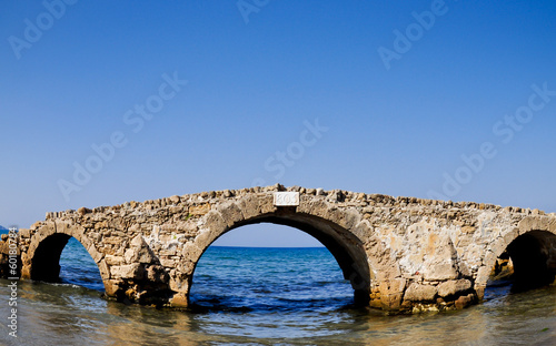 Ruined bridge in the sea. Zakynthos. Greece