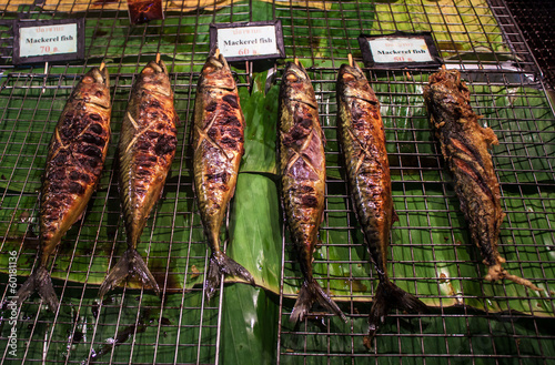 Obraz na plátně BBQ fish on a night market in Thong Sala village