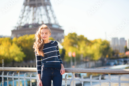 Girl in Paris on a sunny spring or fall day