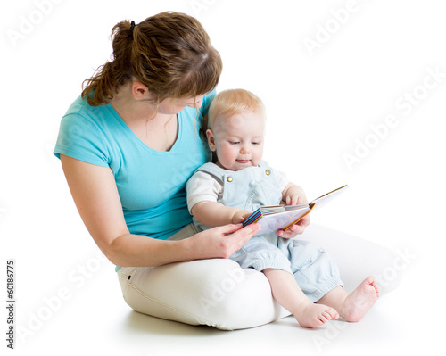 mother reading a book to he...