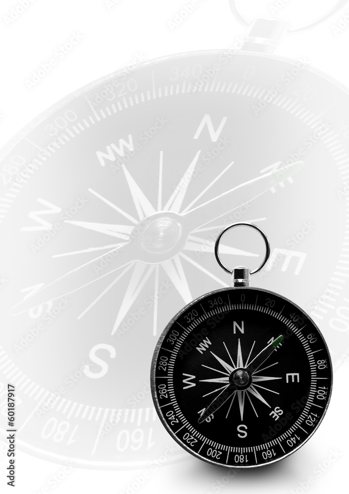 Black magnetic portable compass on white