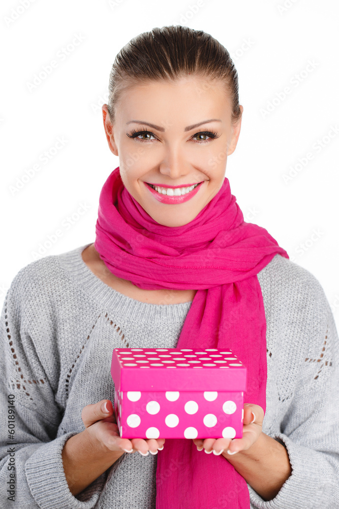Portrait of a beautiful young woman in pink scarf gift Portrait of a beautiful young woman in pink scarf gift