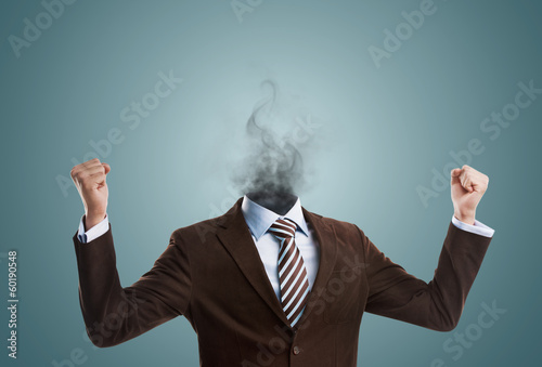 Overworked burnout business man standing headless with smoke ins