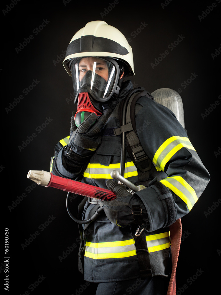 Firefighter in protective gear Firefighter in protective gear