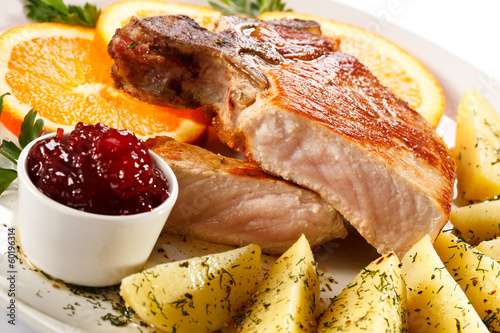 Bilde på lerret Grilled steak, boiled potatoes and lingonberry jam