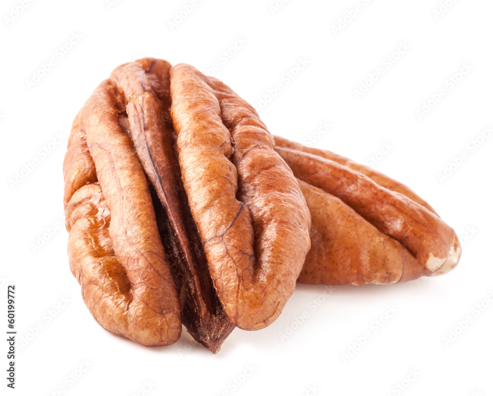 Peeled pecan nuts closeup, isolated on white background Peeled pecan nuts closeup, isolated on white background