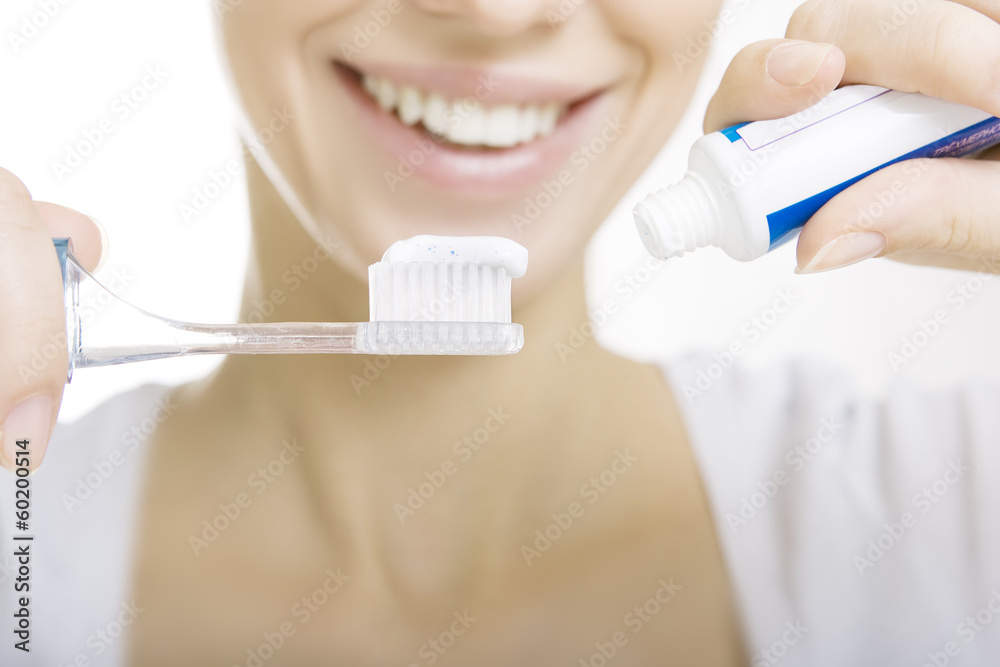 Fototapeta premium Closeup girl with toothbrush cleaning teeth at home, whiten toot