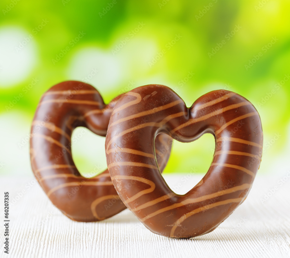 Chocolate hearts on nature backgroud Chocolate hearts on nature backgroud
