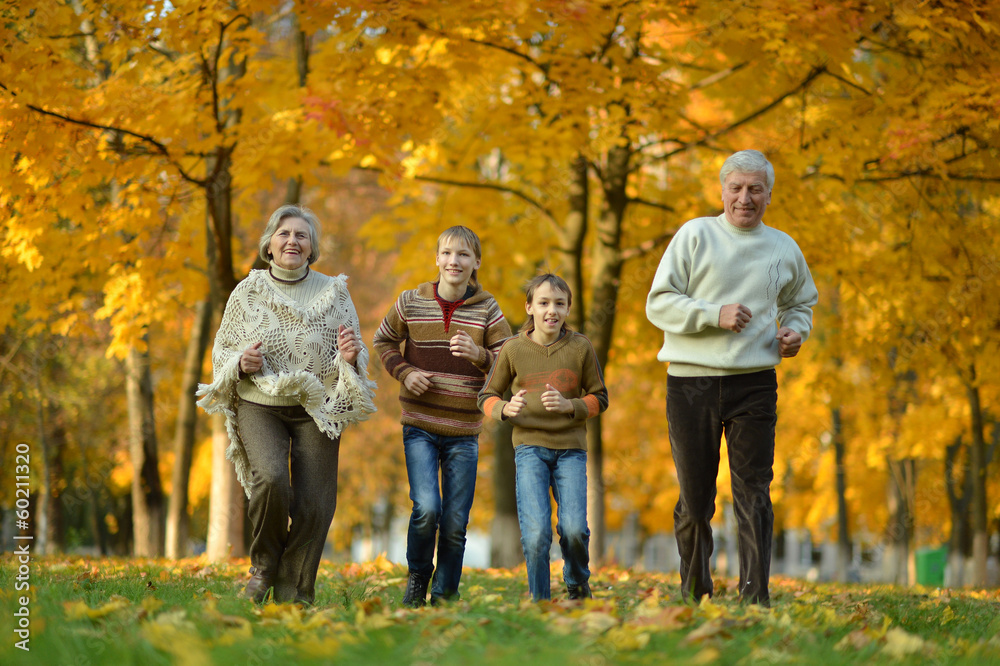 Older man and woman with grandchildren Older man and woman with grandchildren