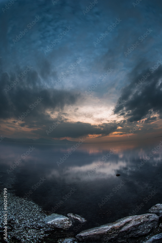 heavenly clouds over ocean at blue hours