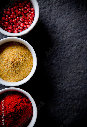 Assorted spices on stone background