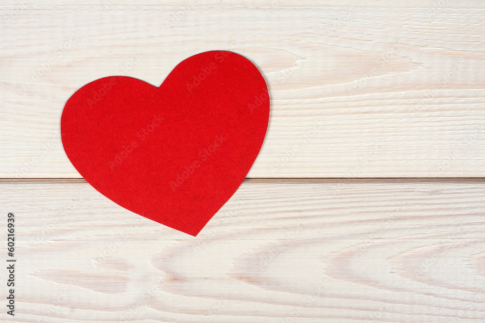 Heart symbol cut out of red paper Heart symbol cut out of red paper