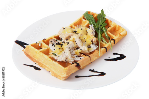 Belgian waffle with a salad of shrimp and mushrooms.