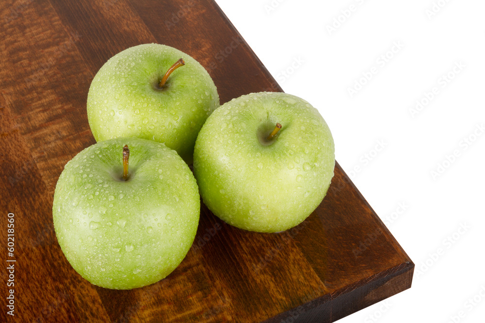 Fresh juicy water-sprinkled apples on white background Fresh juicy water-sprinkled apples on white background