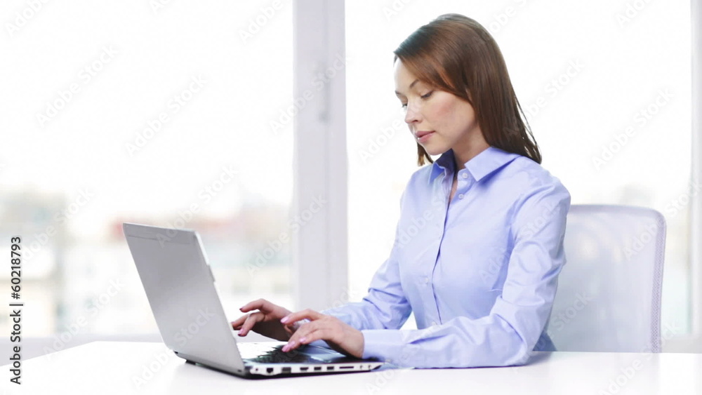 busy businesswoman with laptop in office busy businesswoman with laptop in office