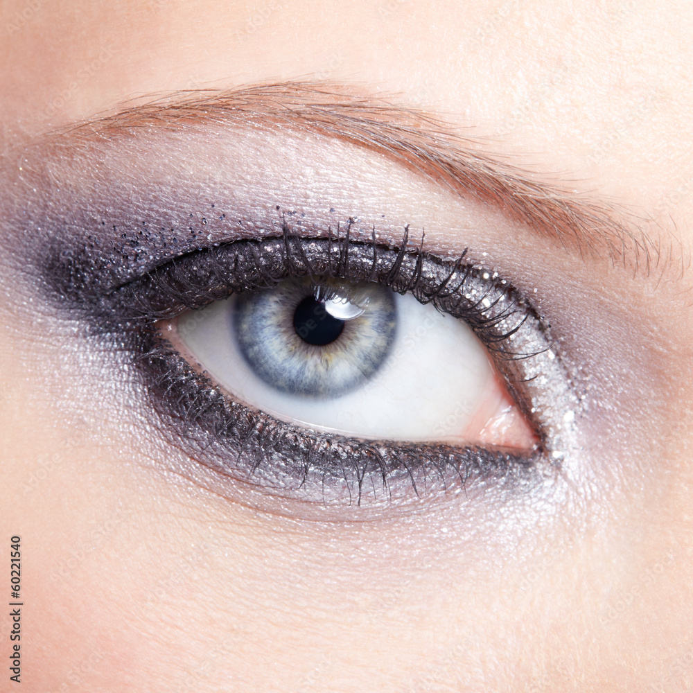 Obraz premium Shining woman eyes makeup