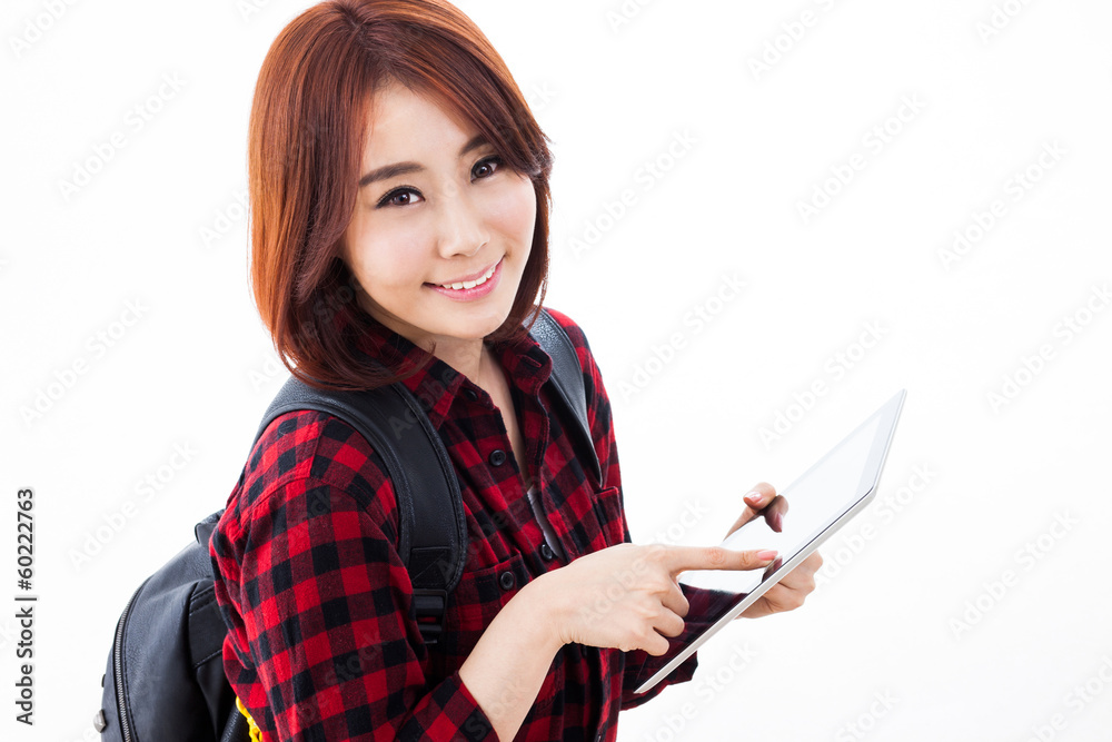 Young Asian student woman using a pad PC Young Asian student woman using a pad PC