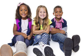 Diverse group of school kids isolated on white background