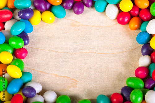 frame  a background  colorful sweets of sugar candies