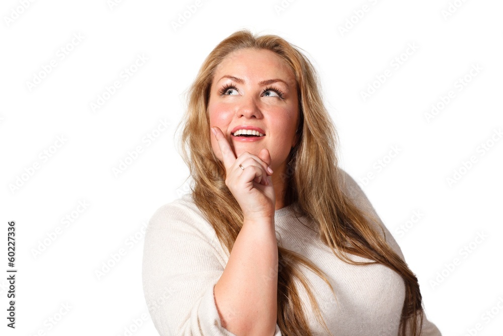 Young woman looking upwards.