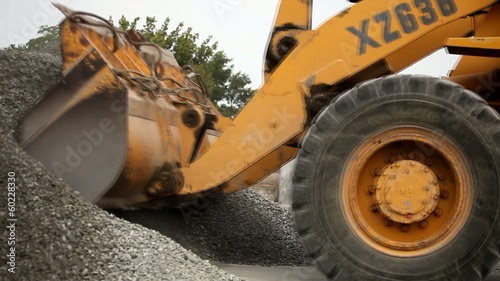 excavator transports rubble