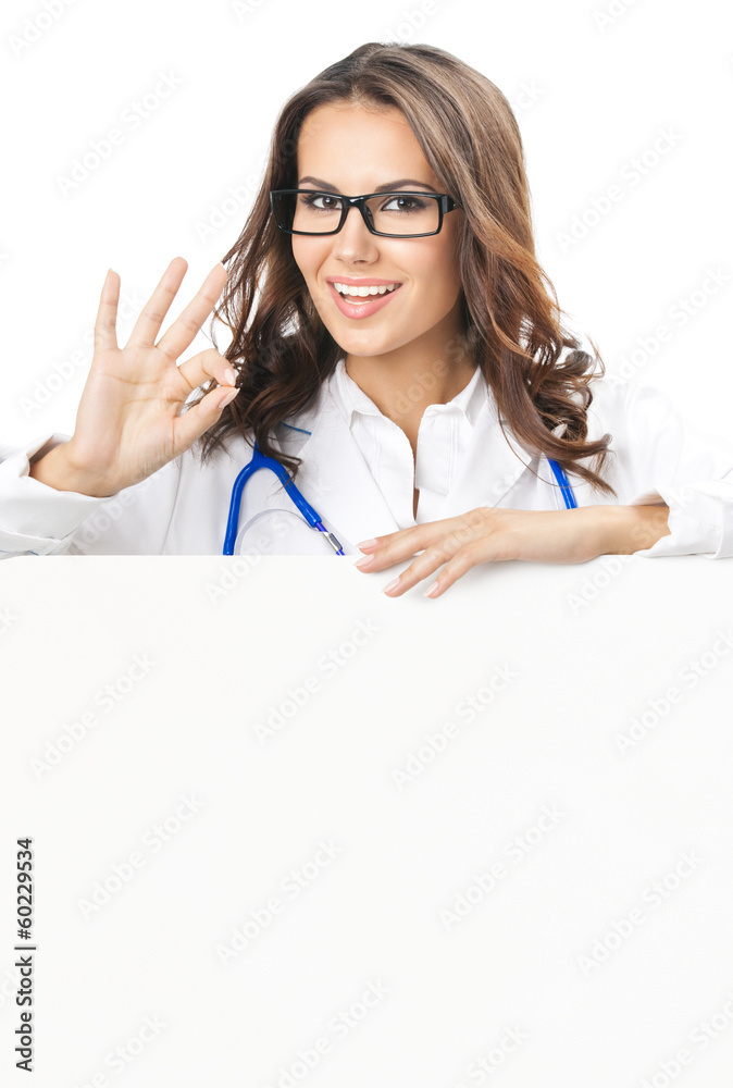 Doctor showing blank signboard, isolated Doctor showing blank signboard, isolated