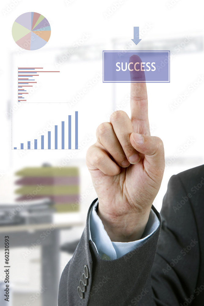 A businessman pressing a virtual button isolated against a white A businessman pressing a virtual button isolated against a white