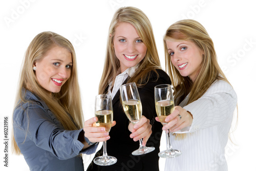 three women holding glasses