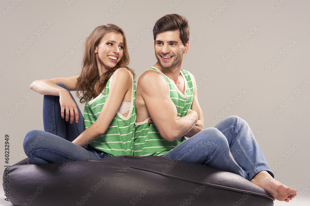 Portrait of smiling young couple at home Portrait of smiling young couple at home
