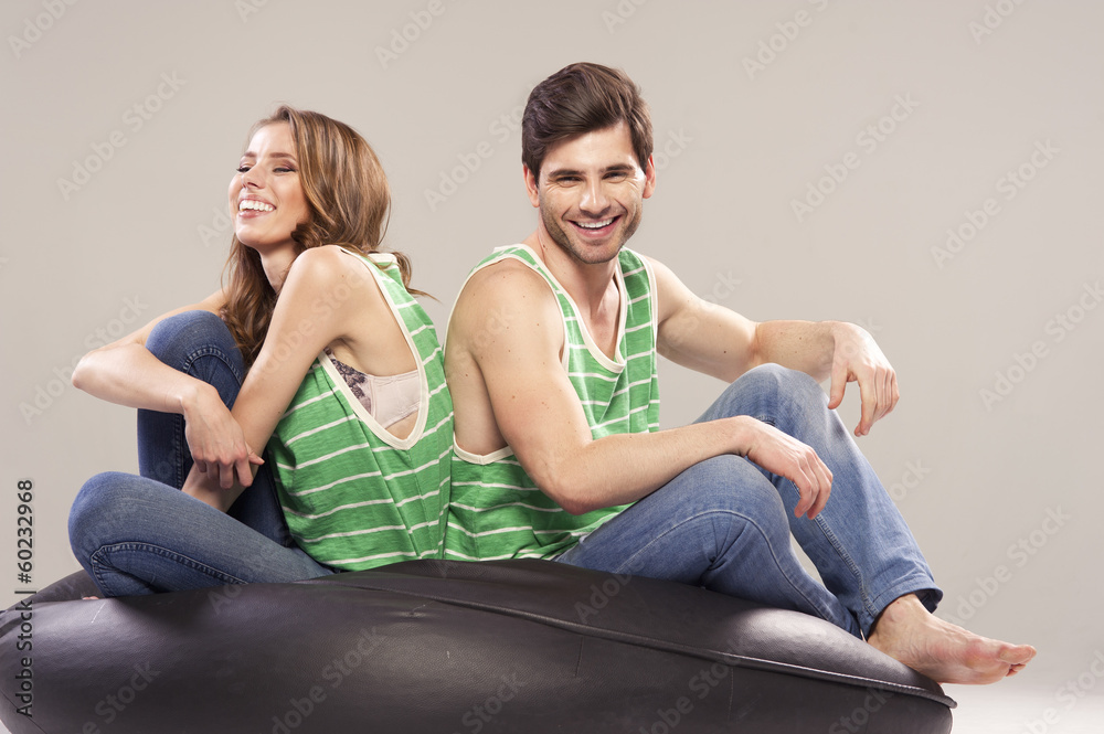 Portrait of smiling young couple at home Portrait of smiling young couple at home