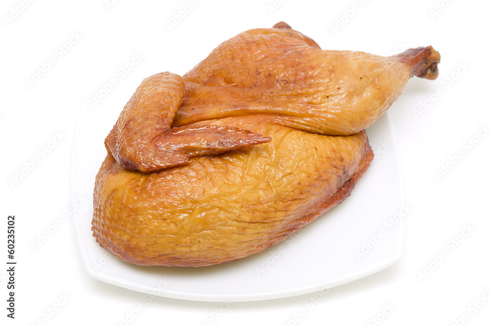 roasted chicken on a plate on white background roasted chicken on a plate on white background