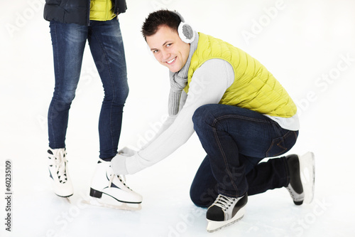 Tying ice skates