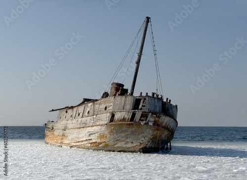 Old ruined-ship tossed on the sea shelf © Georgy Khrushchev