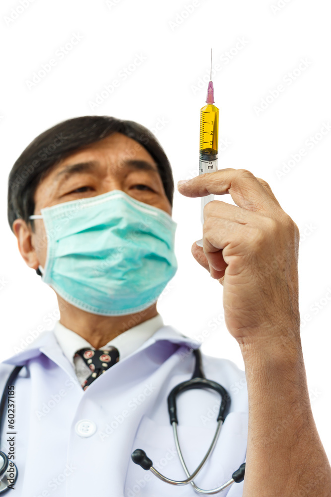 asian doctor is holding syringe asian doctor is holding syringe