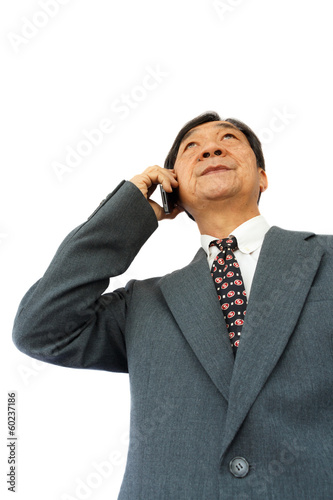 businessman is calling and thinking to something