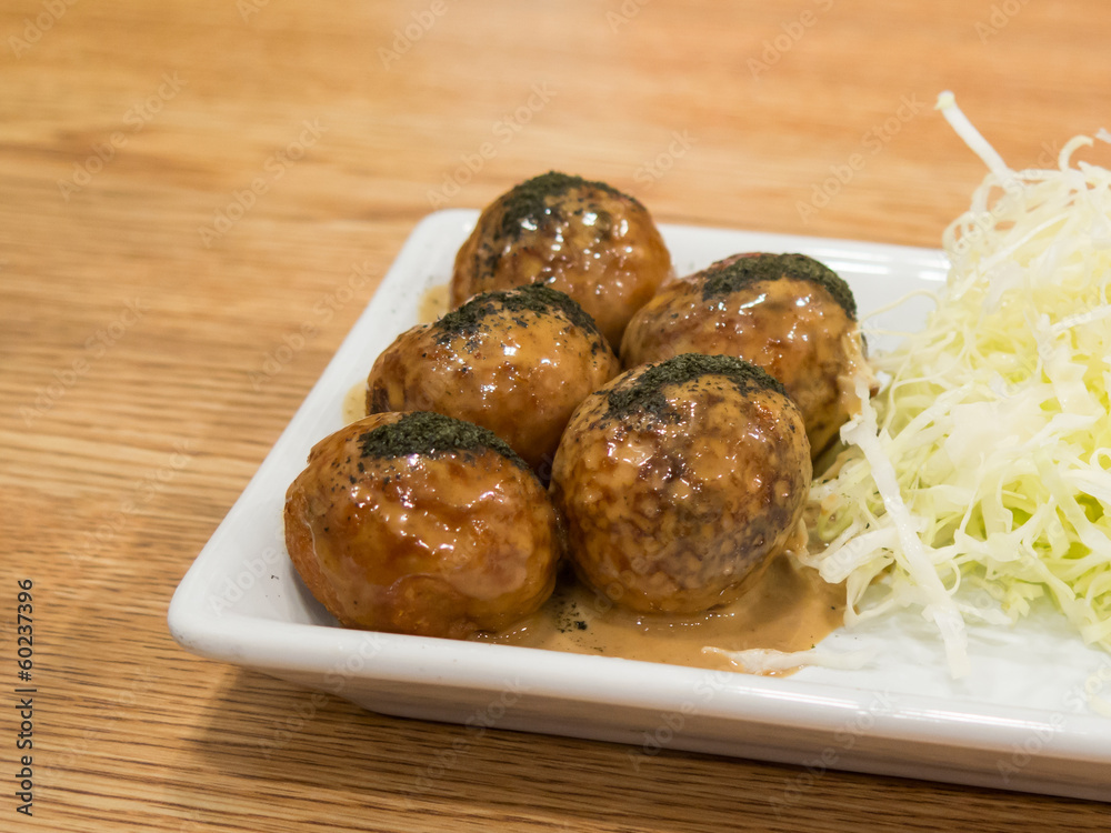 Japanese snack food, Takoyaki and beef close up Japanese snack food, Takoyaki and beef close up